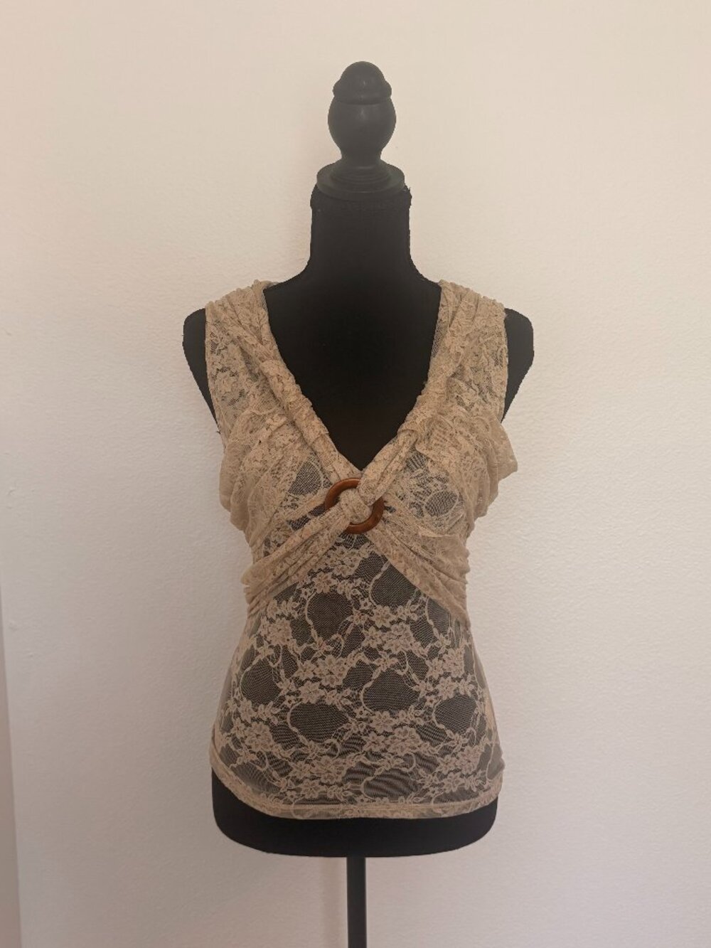 Euro lace top by Fhertron Barcelona in a tagged medium but could fit a small.